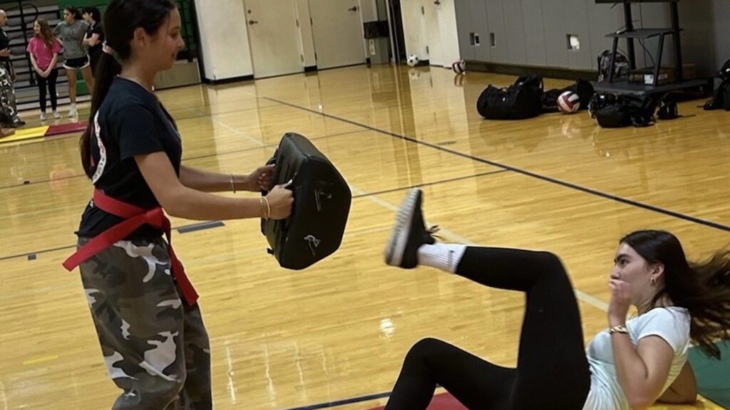 Fearless Future empowers senior girls entering solo living by teaching essential self-defense skills, with a focus on confidence, situational awareness, and basic ground defense.