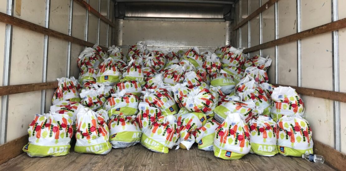 Bags filled with food for families in Liberty City. Photo Credit: Andrew Britton